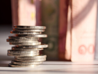 A lot of coins in the concept of saving money and finance.Selection focus.