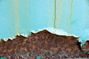 Damaged and rusty iron surfaces or walls.