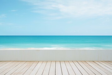 Fototapeta premium Wooden pier overlooking beautiful turquoise ocean and clear blue sky, perfect background for summer vacation and travel concepts