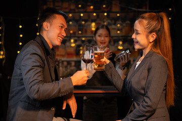 Couples celebrate birthday parties and holidays, happy life at night at nightclub