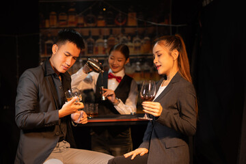 Couples celebrate birthday parties and holidays, happy life at night at nightclub