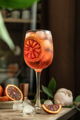 Classic Aperol Spritz cocktail. Aperol, prosecco and soda water served with sliced orange in wine glass. Italian summer cocktail