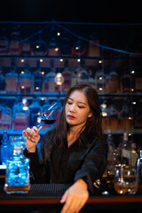Closeup business woman holding a glass of wine