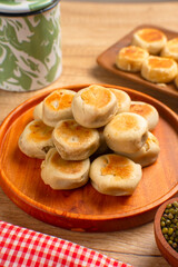 Bakpia is a flat round cookie, made from a mixture of green beans and sugar, then wrapped in flour dough and baked. This cookie is popular as a typical Yogyakarta souvenir.