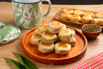 Bakpia is a flat round cookie, made from a mixture of green beans and sugar, then wrapped in flour dough and baked. This cookie is popular as a typical Yogyakarta souvenir.