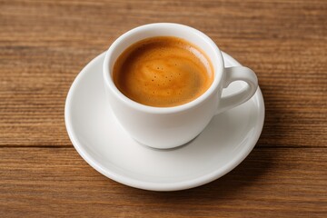 Naklejka premium A steaming espresso served in a cup on a rustic wooden surface