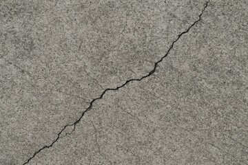 Obraz premium Concrete surface with a cracked texture