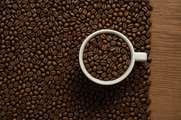 Fototapeta premium A mug filled with roasted coffee beans