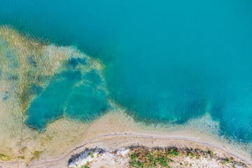 Aerial view of a quarry lake in the Hessisch Ried region near Geinsheim