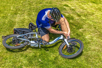 Cyclist with a broken leg and sprained ankle after an electric bike accident, the accident area is...