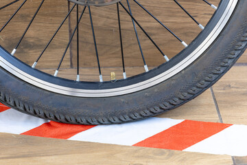 Flat tire on electric bike, pumping air into bike inner tube, bike inspection