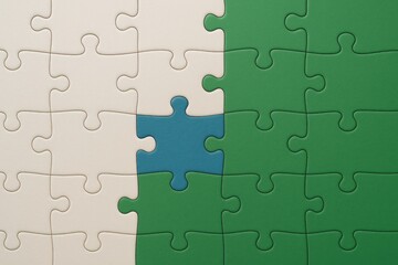Fototapeta premium A jigsaw puzzle consisting of two differently colored pieces