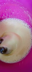 A delightful creamy mixture carefully prepared and served in an eyecatching pink bowl