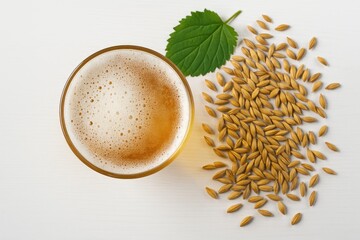 Top-down view of a beer glass with malt in the backdrop