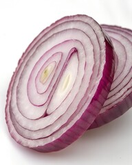 Two slices of red onion showing concentric rings isolated on white background
