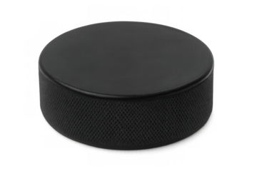 Classic black hockey puck isolated against a transparent background, poised for action on the ice, ready for intense game competition