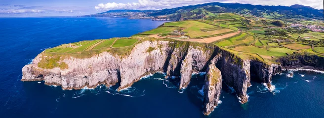 Fotobehang Azores , Portugal. amazing Sao Miguel island. aerial drone panorama of miradouro do Cintrao with impressive rugged rocks and ocean in norther part © Freesurf