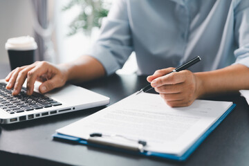 Business person with contract law and paper work for business finance, loan application form,...