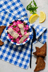 Traditional Swedish salad with herring, apple and beetroot.top veiw