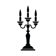 Elegant candelabra with three candles silhouette