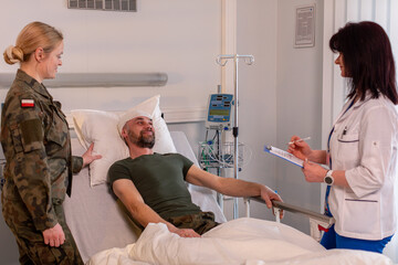 Military Personnel Providing Support During Hospital Visits to Patients Receiving Care