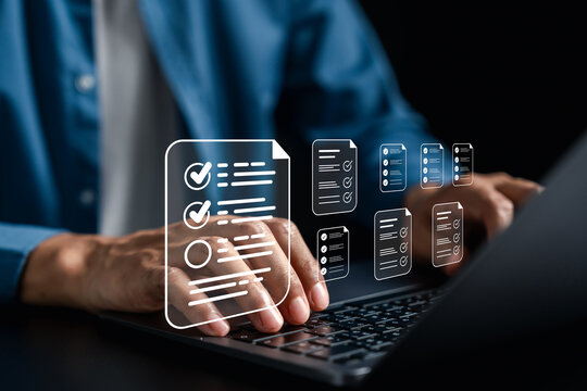 Digital document checklist and online survey form concept. User interacting with digital forms on a laptop, showing task approval and checklist workflow for productivity and data submission systems.
