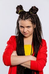 A Young Girl Radiating Confidence with Her Beautifully Braided Hair in a Bold Outfit