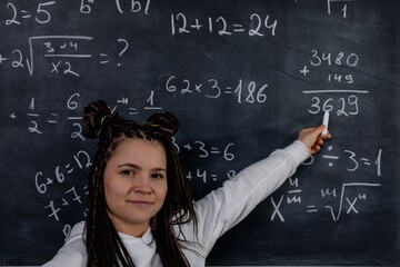 An enthusiastic Math Teacher engages students with Algebra concepts to enhance learning