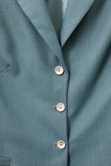 An Elegant Green Blazer That Showcases Beautiful And Stylish Button Detail Perfectly