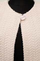 Stylish and Textured Knit Cardigan Featuring a Convenient Button Closure for Easy Wear