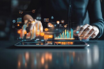 Person interacting with digital tablet displaying financial graphs and icons
