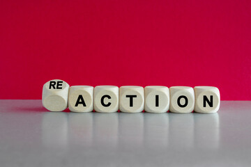 Action and reaction symbol. Turned a dice and changes the word action to reaction. Beautiful pink...