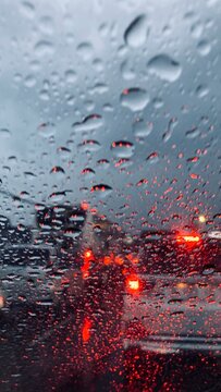 Rainy day traffic view from car window
