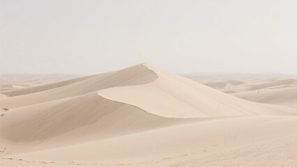 Serene desert landscape with rolling sand dunes under a soft hazy sky