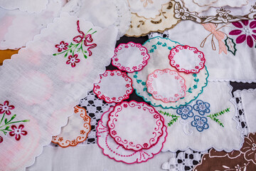 Close up view of white napkins with embroidery in Funchal, Madeira, Portugal