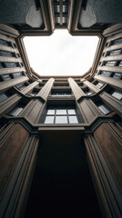 Look up at the architectural details of a historic building in the city center