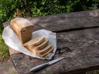 A loaf of bread sitting on top of a wooden table