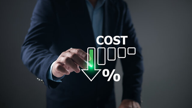 Businessman pointing green downward arrow with cost reduction percentage icon. saving money concept, cutting expenses, increasing efficiency, financial strategy, business cost optimization for success