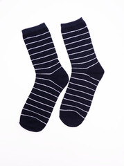 Pair of navy blue socks with white stripes displayed on a clean white background, showcasing the textile design and pattern for fashion and apparel marketing purposes