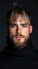 Fototapeta premium Close-Up Portrait of a Young Man with Stylish Hair and Beard