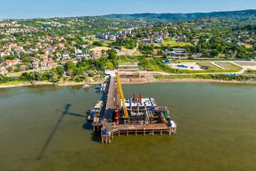 Novi Sad, Serbia - June 27, 2025: Construction of the Chinese bridge over the Danube River in Novi Sad