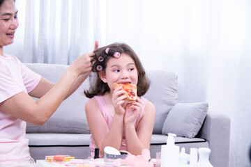 Kids, cosmetic, child, beauty, girl, A multicultural girl eating a snack while getting her hair...