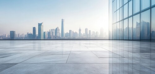 Fototapeta premium Empty rooftop plaza overlooking a hazy cityscape