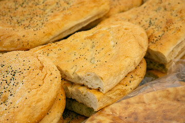 Selling a variety of Turkish breads at the Kreuzberg Turkish Market in Berlin.