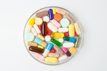 Clock made of pills capsules, pills form a circle, omega, vitamins, Cod liver oil, supplements