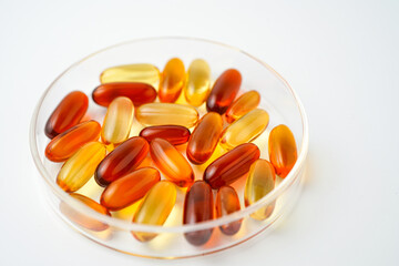 Vitamins capsules, fish oil, soft gels, supplements, omega 3, omega 9, vitamin D, vitamin E