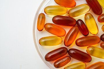 Vitamins capsules, fish oil, soft gels, supplements, omega 3, omega 9, vitamin D, vitamin E