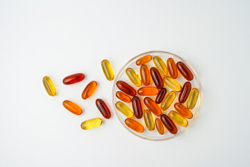 Vitamins capsules, fish oil, soft gels, supplements, omega 3, omega 9, vitamin D, vitamin E