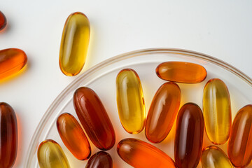 Vitamins capsules, fish oil, soft gels, supplements, omega 3, omega 9, vitamin D, vitamin E