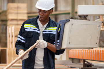 Black people, Carpenter and furniture workshop. African American male carpenter using tools for...